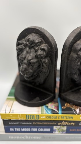 Lion head bookends likely - lion,