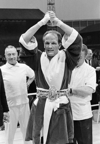 Henry cooper receiving the - cooper,