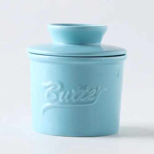 Ceramic butter dish with - butter,