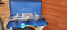 Campingaz gas cooker and gas bottles. A double burner with grill and regulator