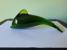 AN ATTRACTIVE WEDGWOOD GREEN GLASS DOLPHIN: 8" LONG: GOOD CONDITION