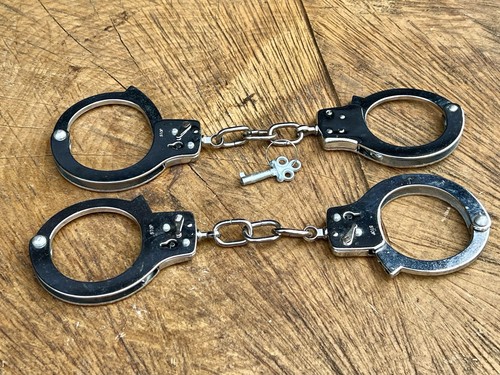 Two sets handcuffs carbon - two,