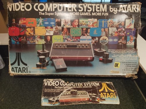 Atari 2600 boxed with - , all