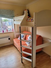 Stompa high sleeper bed with