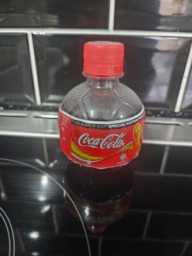 Coca cola plastic unopened - cola,