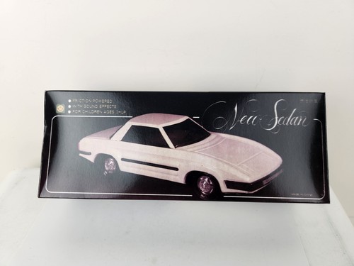 Vintage friction sedan tin car - friction,
