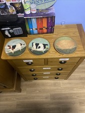 Ornamental Plates With Animals On It