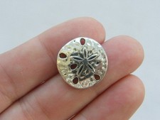 8 Sand dollar charms antique