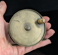 Antique brass fishing reel