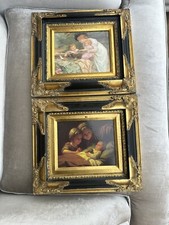 A Pair of black and gold