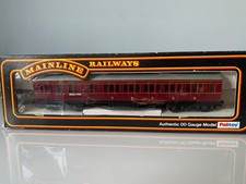 Mainline LMS 3rd class corridor brake coach. Boxed. Good condition.