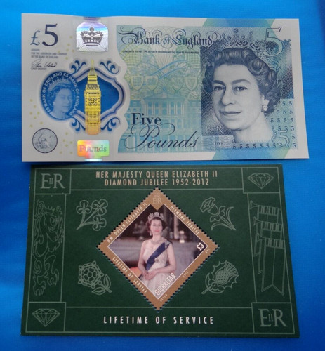 Polymer banknote of - £,