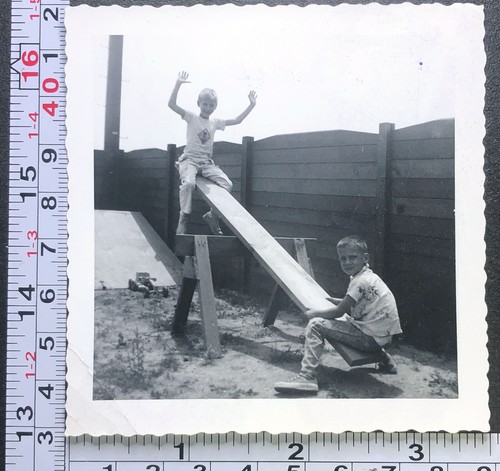Two boys teeter totter - two,