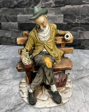Vintage Old Man Sitting On
