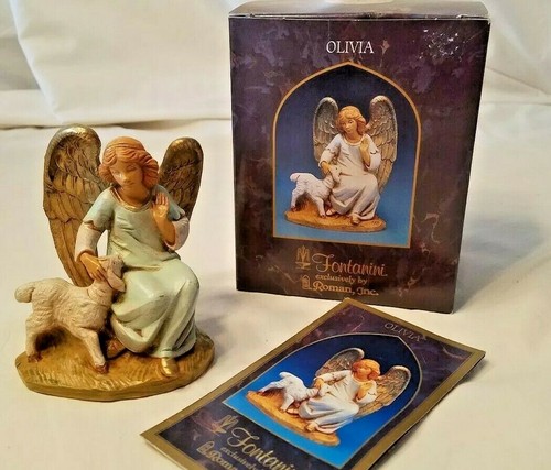 2001 olivia sitting angel - 2001,