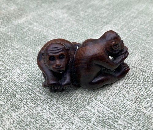 Netsuke depicting seated - 2,