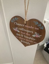 Wooden heart slogan message