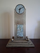 Arts and Crafts style decorative gilded clock