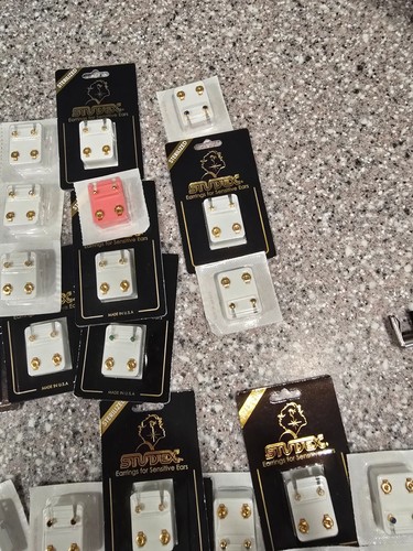 Ear piercing gun with - ear,