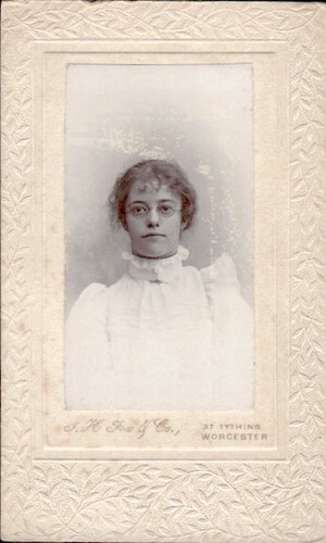 Young woman wearing glasses - wearing,