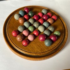 Old solitaire set with 33 stone / clay marbles approx 9/16"