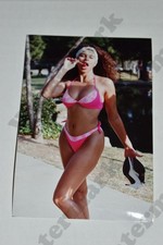 busty woman in pink bikini