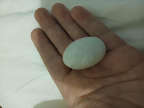 Small smooth stone - found, on