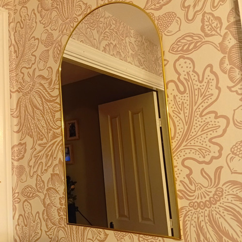 Arched gold metal framed wall - arched,