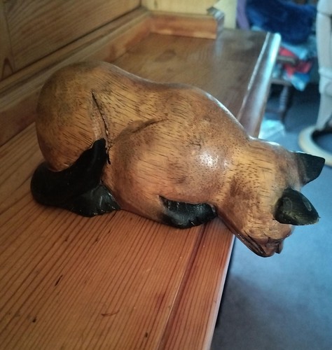 Wooden carved cat leaning - carved,