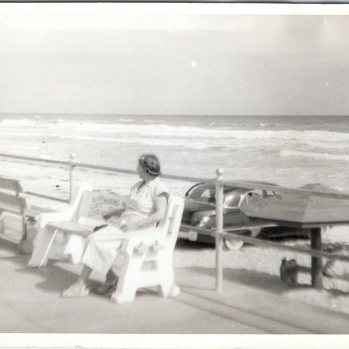 C1950s woman bench beach - c1950s,