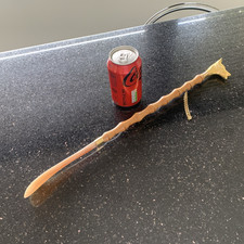 long wooden shaft shoe horn with gold coloured fox head topper.