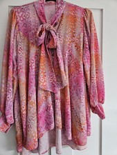 Pink Pussy Bow Swing Top. Used