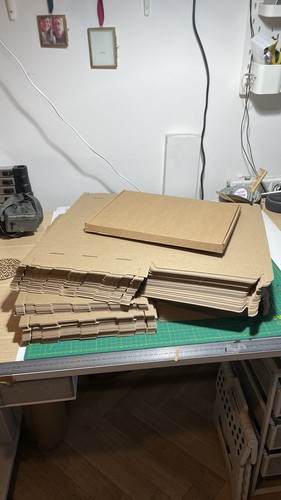 Flat packed cardboard postage - flat,