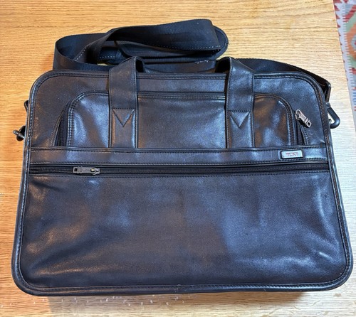 Black leather tumi - black,