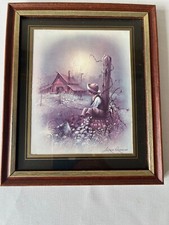 Vintage framed print of a boy by Andres Orpinas