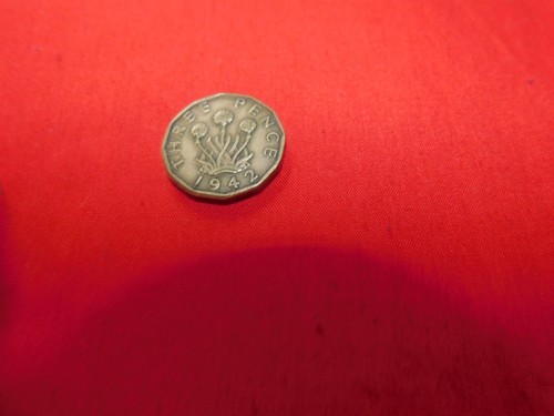 Collectable three pence - three,