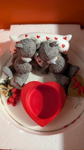 You bear figurine - to,