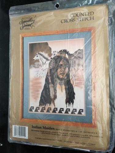 New and sealed cross stitch - and,