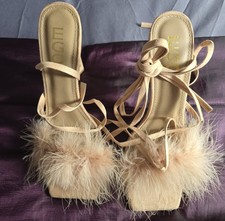 Aubrie Fluffy Faux Feather