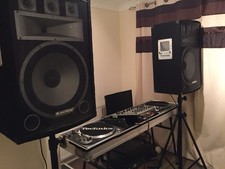 DJ Equipment: Decks, Mixer, Speakers, Stands, Cables, Housing Unit, Microphone.
