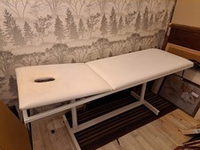 Massage Table used - in good condition. Stationary. Massage, reiki, acupunture