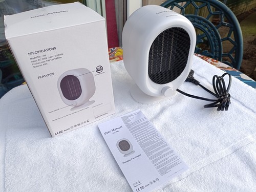 New portable electric heater - new,