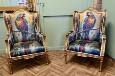 A Pair of Salon Chairs with Silk Parrot Design