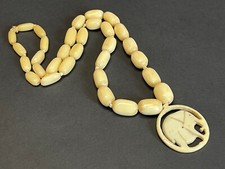 Antique Ivory coloured carved