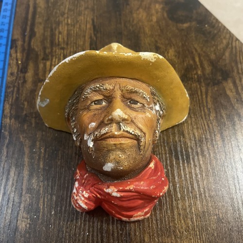 Vintage chalkware rawhide face - chalkware,
