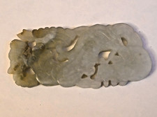 Jade amulet double sided carved dragon celadon amulet 90 x 45 x5 mms
