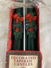 A PAIR OF VINTAGE CHRISTMAS TAPERED CANDLES. APPROX 10 IN HIGH . BN