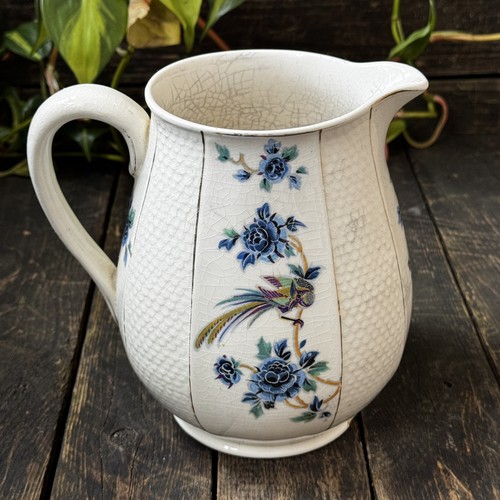 Peacock pitcher 1930s