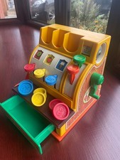 Fisher Price 1980s cash register till. Plus free f/p music box with 5 discs.