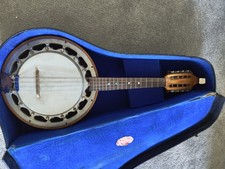 Marius Vintage Banjolin, Includes case.  Fully playable but with wear and dust